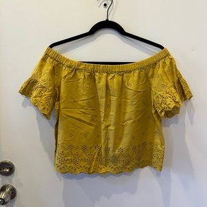 Gold off the shoulder eyelet top